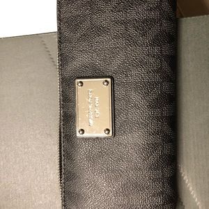 Michael kors black signature zip around wallet